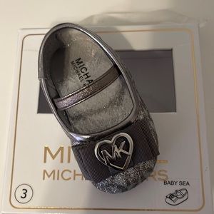 Brand new, never worn. In box